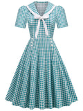Peacock Blue 1950s Polka Dot Swing Dress