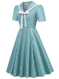 Peacock Blue 1950s Polka Dot Swing Dress